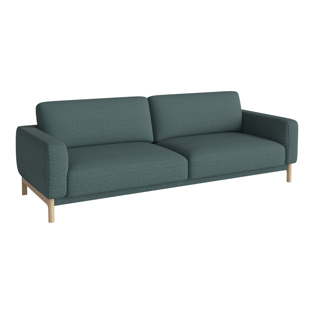Teal upholstered sofa with a smooth texture and minimalist design, featuring natural wood legs.