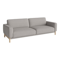 Gray upholstered sofa with minimalist design and natural wood legs, featuring a solid color without patterns.
