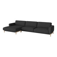 Modern black sectional sofa with clean lines and minimalist design, featuring smooth fabric and wooden legs.