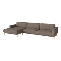 Modern sectional sofa in warm brown upholstery with smooth fabric and minimalist gold legs. Perfect for stylish living spaces.