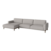 Light gray sectional sofa with a smooth, modern design and subtle stitch detailing. Perfect for contemporary interiors.