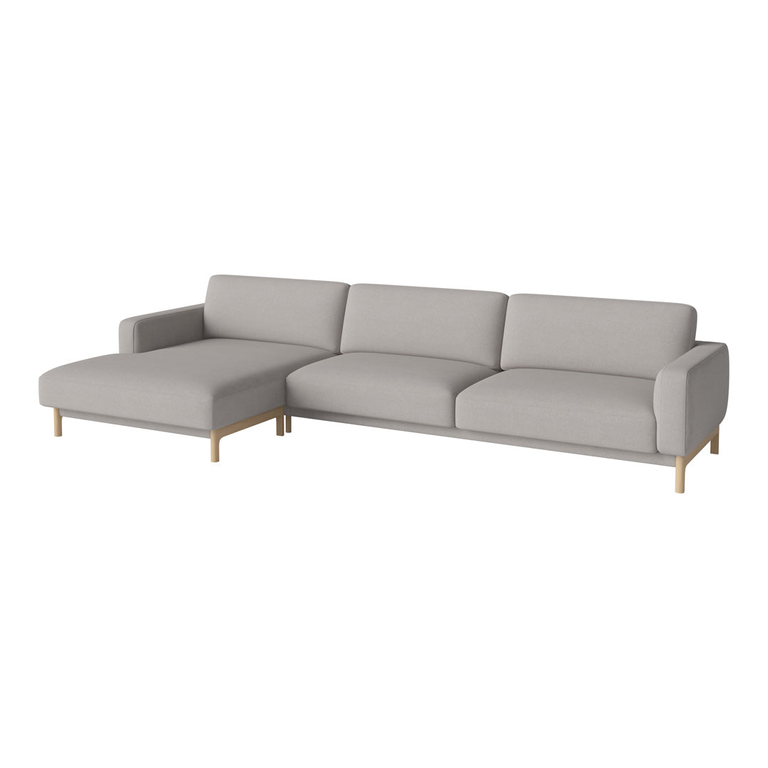 Gray modular sofa with clean lines and smooth fabric, featuring wooden legs for a modern touch.