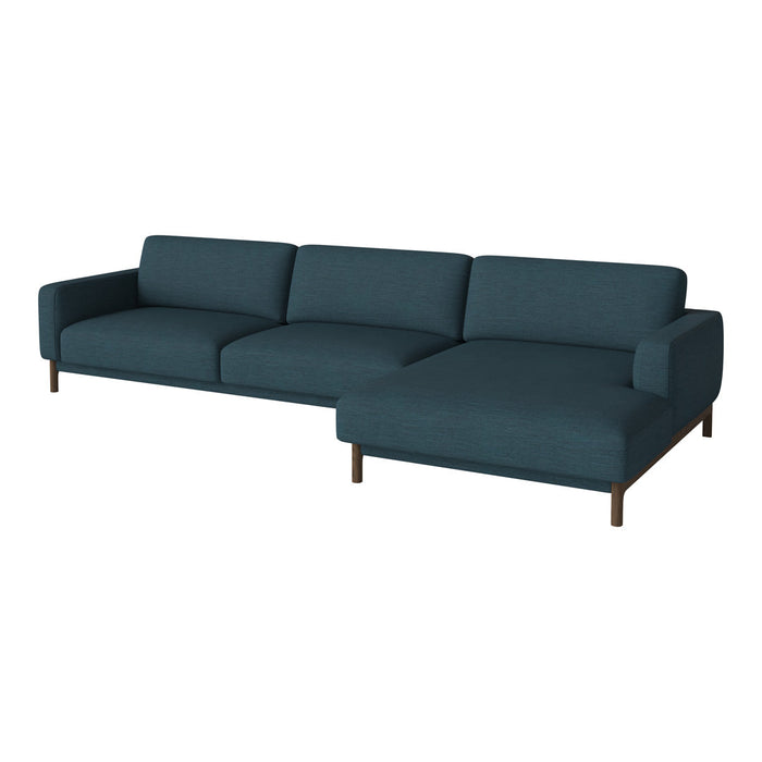 Teal fabric sectional sofa with a contemporary design and clean lines, featuring smooth upholstery and wooden legs.