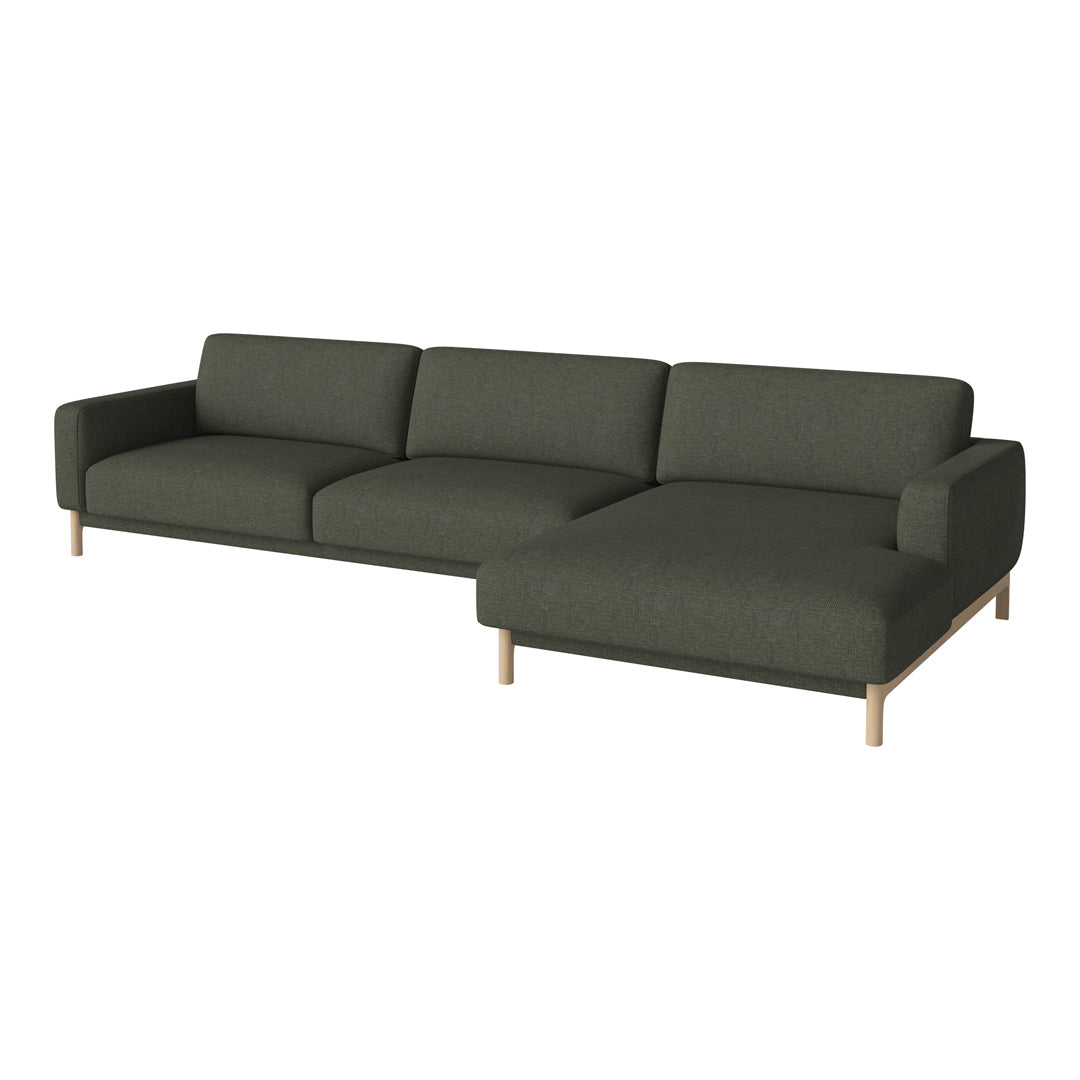 Modern dark green fabric sectional sofa with clean lines and light wood legs, perfect for contemporary living spaces.