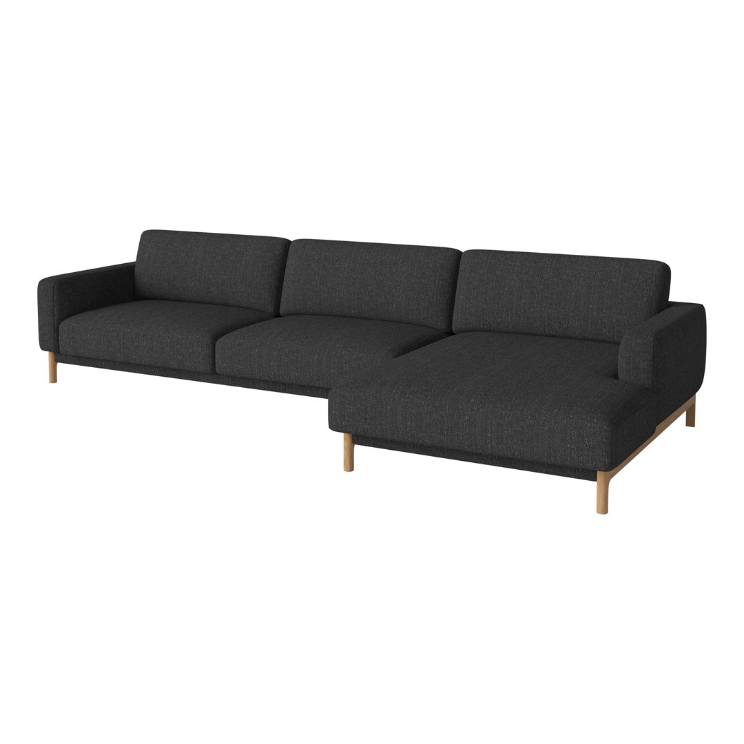 Modern gray sectional sofa with clean lines and a textured fabric, featuring wooden legs for a sleek look.