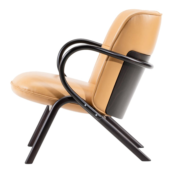 Tan leather chair with dark wood accents, featuring smooth curves and modern design elements.