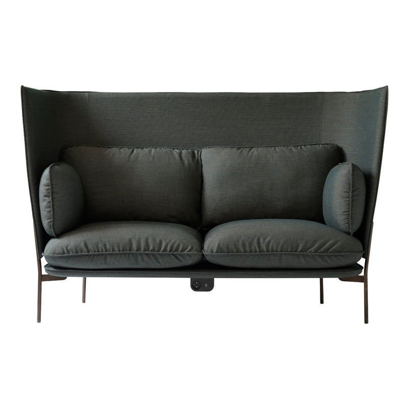 Dark green upholstered sofa with soft cushions and a modern, sleek design featuring a high back.