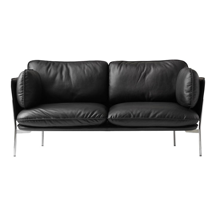Black leather sofa with plush cushions and sleek chrome legs, featuring a minimalist design and no patterns.