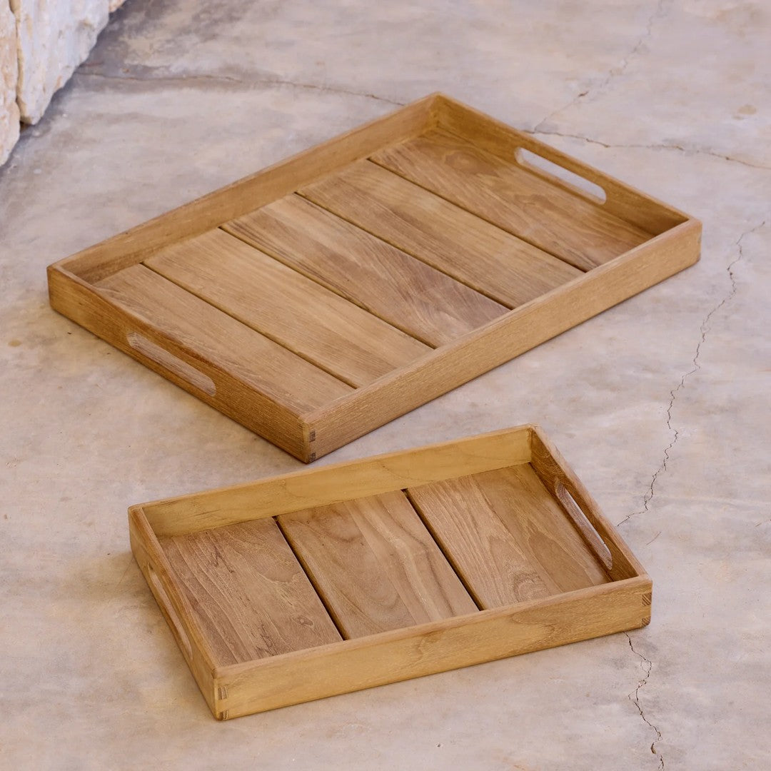Natural wood serving trays in light brown with a slatted pattern. Perfect for various decor styles.