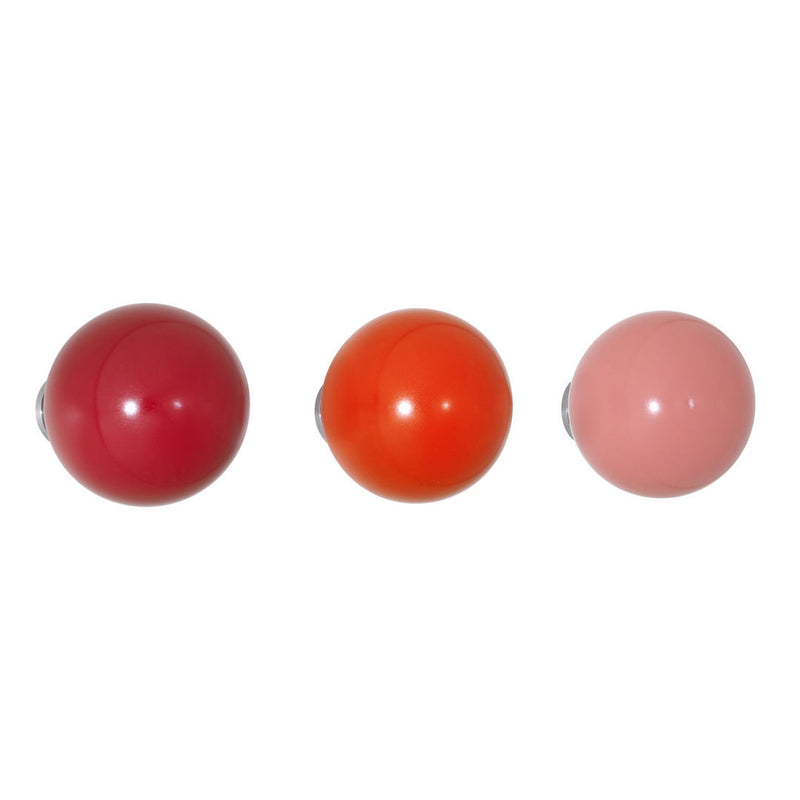 Set of three glossy balls in vibrant shades of fuchsia, orange, and soft pink, showcasing a smooth, solid pattern.
