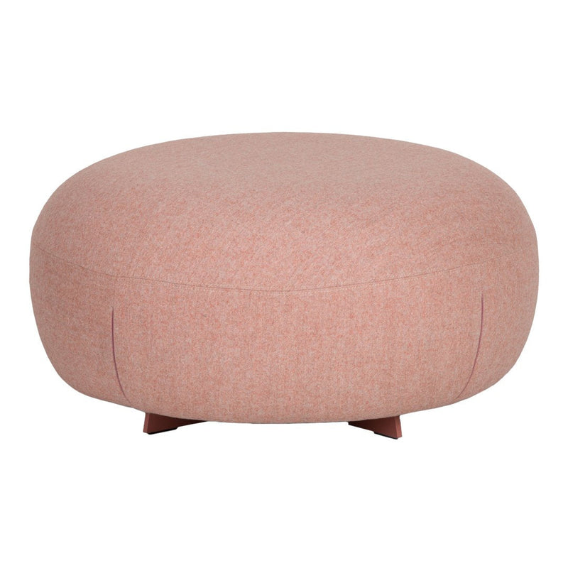 Round ottoman in soft blush pink fabric, featuring a smooth, minimalist design without patterns.