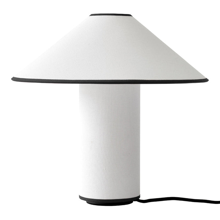 Minimalist white lamp with a conical shade and black accents. Clean design perfect for modern decor.