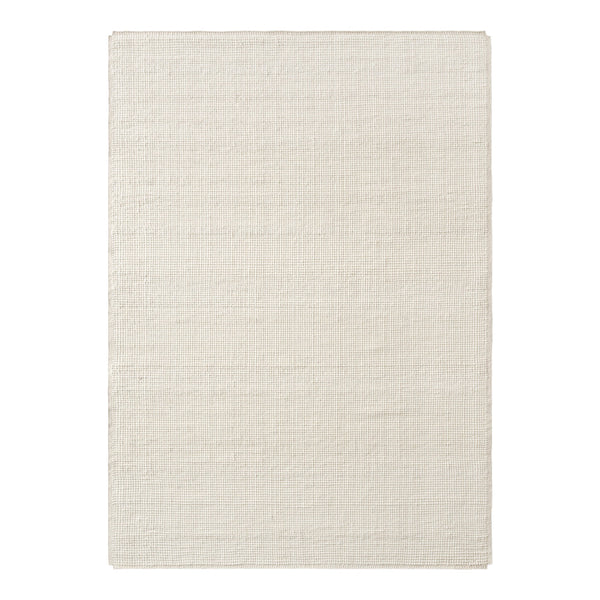 Light beige rectangular rug with a subtle textured pattern, perfect for enhancing any space.