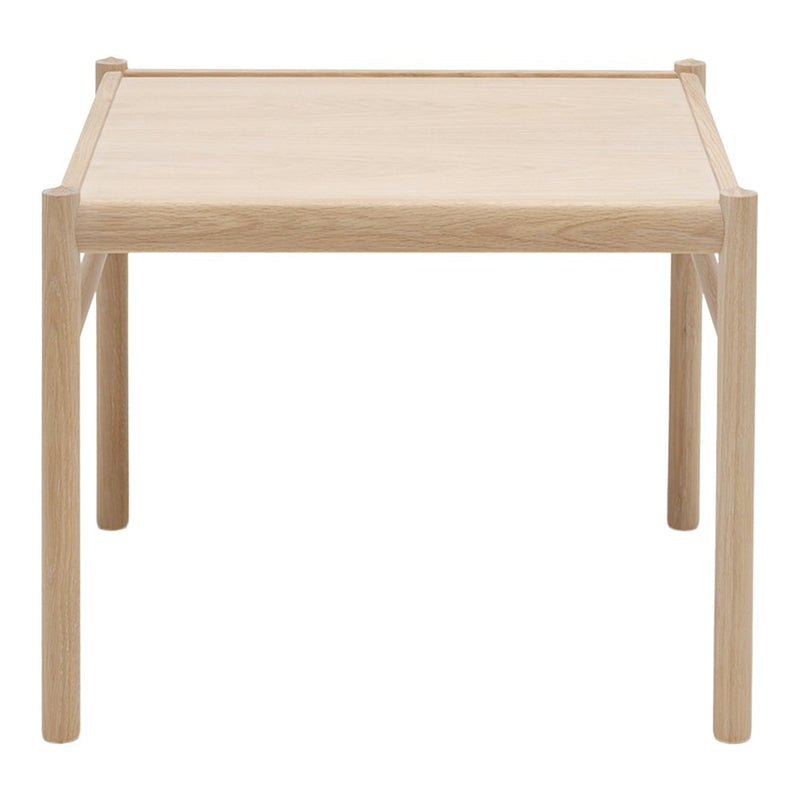 Light oak wood table with a smooth, natural finish and minimalistic design. Perfect for modern interiors.