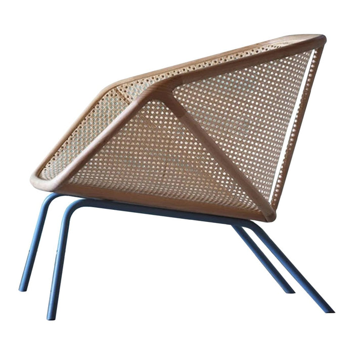 Modern cane chair with a geometric pattern, featuring a natural wood finish and sleek blue metal legs.