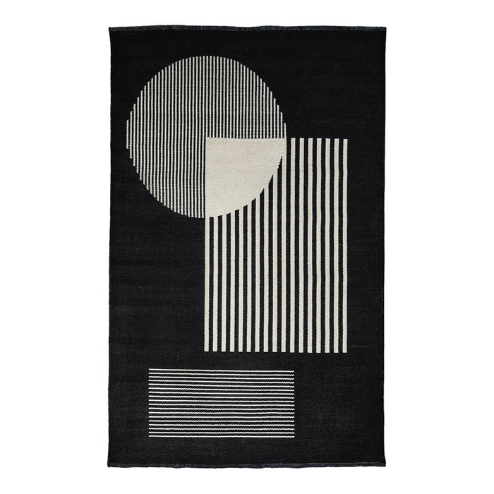 Black geometric rug featuring striped and circular patterns in white. Modern design for stylish home decor.