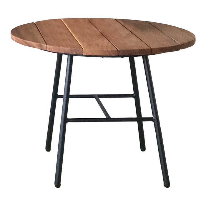 Round wooden table with a natural wood finish and contrasting black metal legs, featuring a slatted pattern.