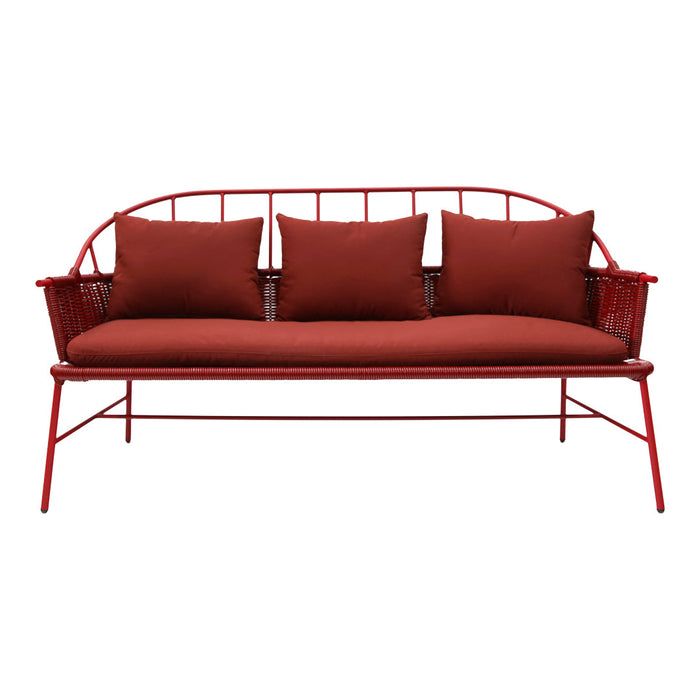 Red metal sofa with deep red cushions, featuring a sleek, modern design and minimalist pattern. Perfect for outdoor spaces.