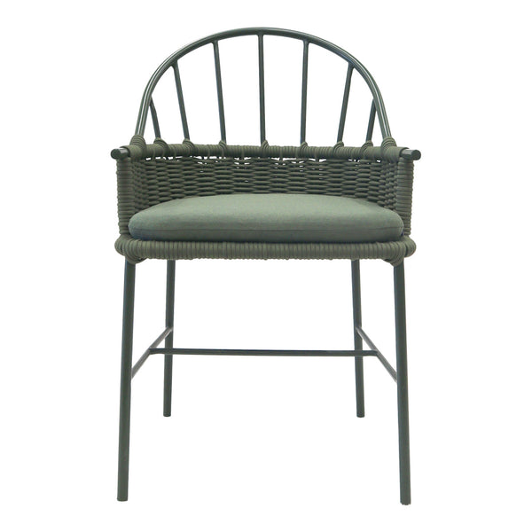Green wicker chair with a round back and soft cushion, featuring a modern design and textured accents.