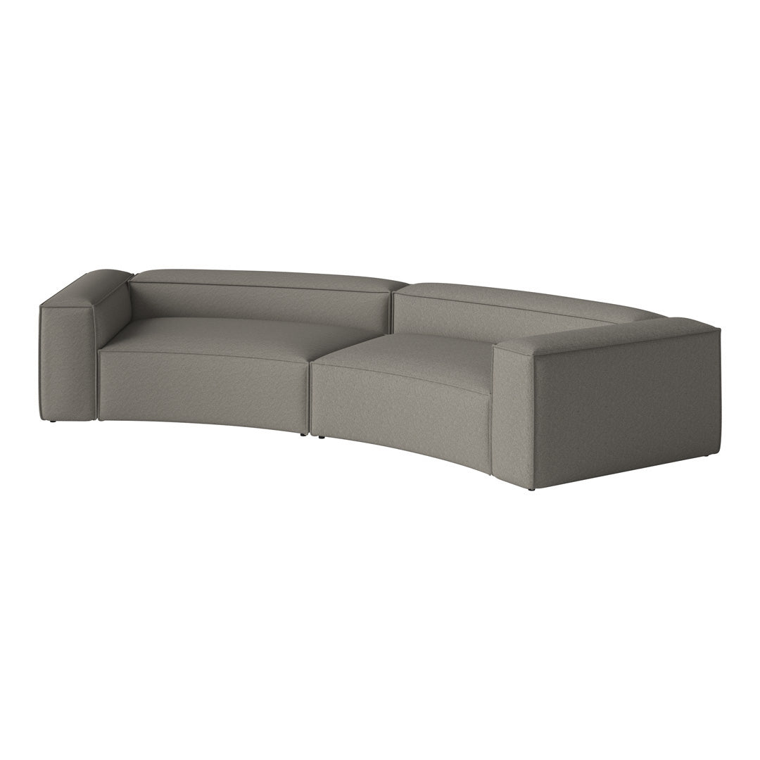 Curved sectional sofa in soft gray fabric with a smooth, minimalist design. Perfect for modern living spaces.