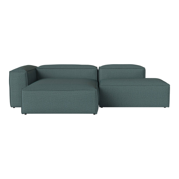 Teal modular sofa with a textured fabric and clean, contemporary design, perfect for modern living spaces.