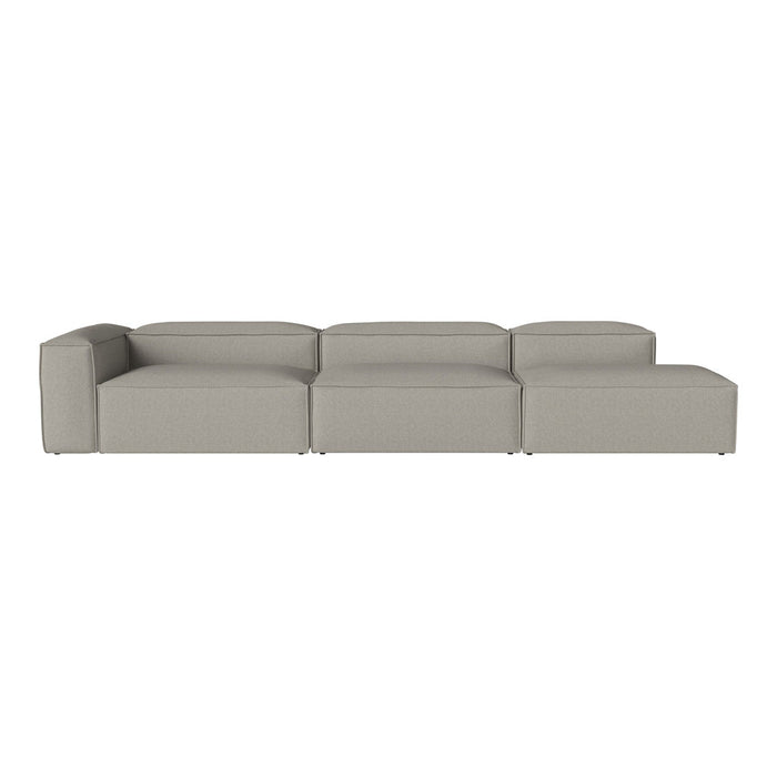 Modern modular sofa in soft light gray with a sleek, minimalist design and smooth fabric texture.