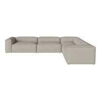 Light gray sectional sofa with minimalist design and smooth, sleek upholstery. Perfect for modern living spaces.