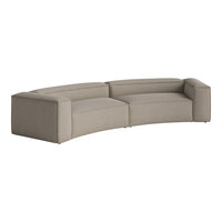 Curved sofa in warm beige with textured linear pattern for modern living spaces. Soft fabric adds cozy elegance.