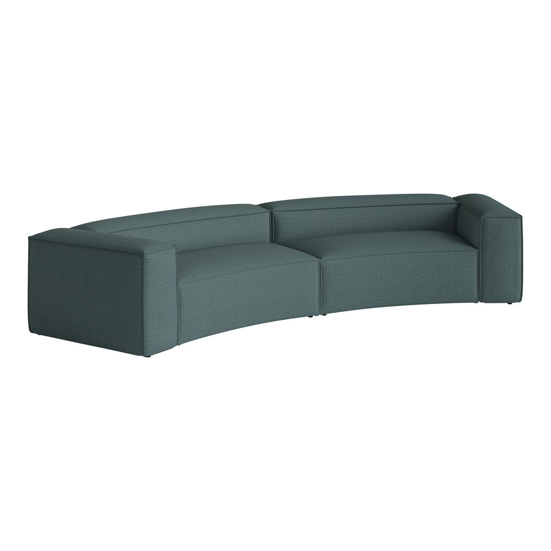 Curved teal modular sofa with a textured fabric finish, perfect for modern living spaces.