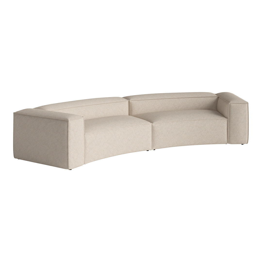 Light beige curved sofa with a subtle geometric pattern, perfect for modern living spaces.