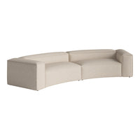 Light beige curved sofa with a subtle geometric pattern, perfect for modern living spaces.