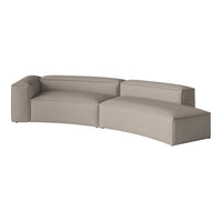 Curved sectional sofa in soft beige fabric with smooth, minimalist design and no visible patterns. Perfect for modern spaces.