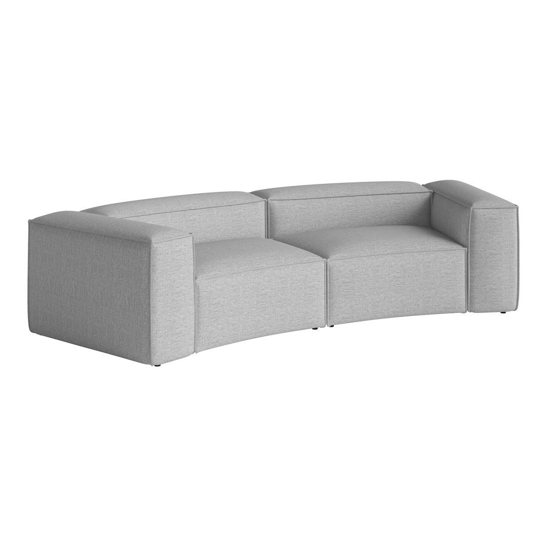 Stylish curved sofa in light gray fabric with a soft, textured finish, perfect for modern interiors.