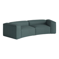 Curved teal sofa with a textured fabric pattern, featuring clean lines and modern silhouette. Ideal for contemporary living spaces.