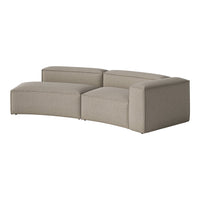 Curved sectional sofa in soft beige with subtle texture and striped pattern for a modern look.