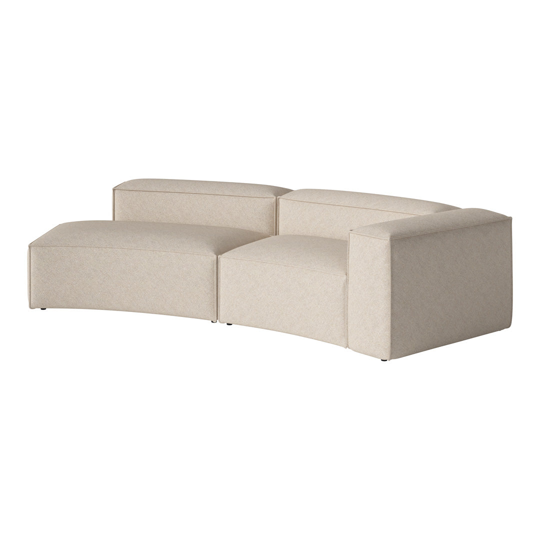 Beige curved sofa with a subtle textured pattern, perfect for modern living spaces.
