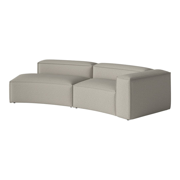 Curved sectional sofa in soft gray fabric with a minimalist texture, perfect for modern living spaces.