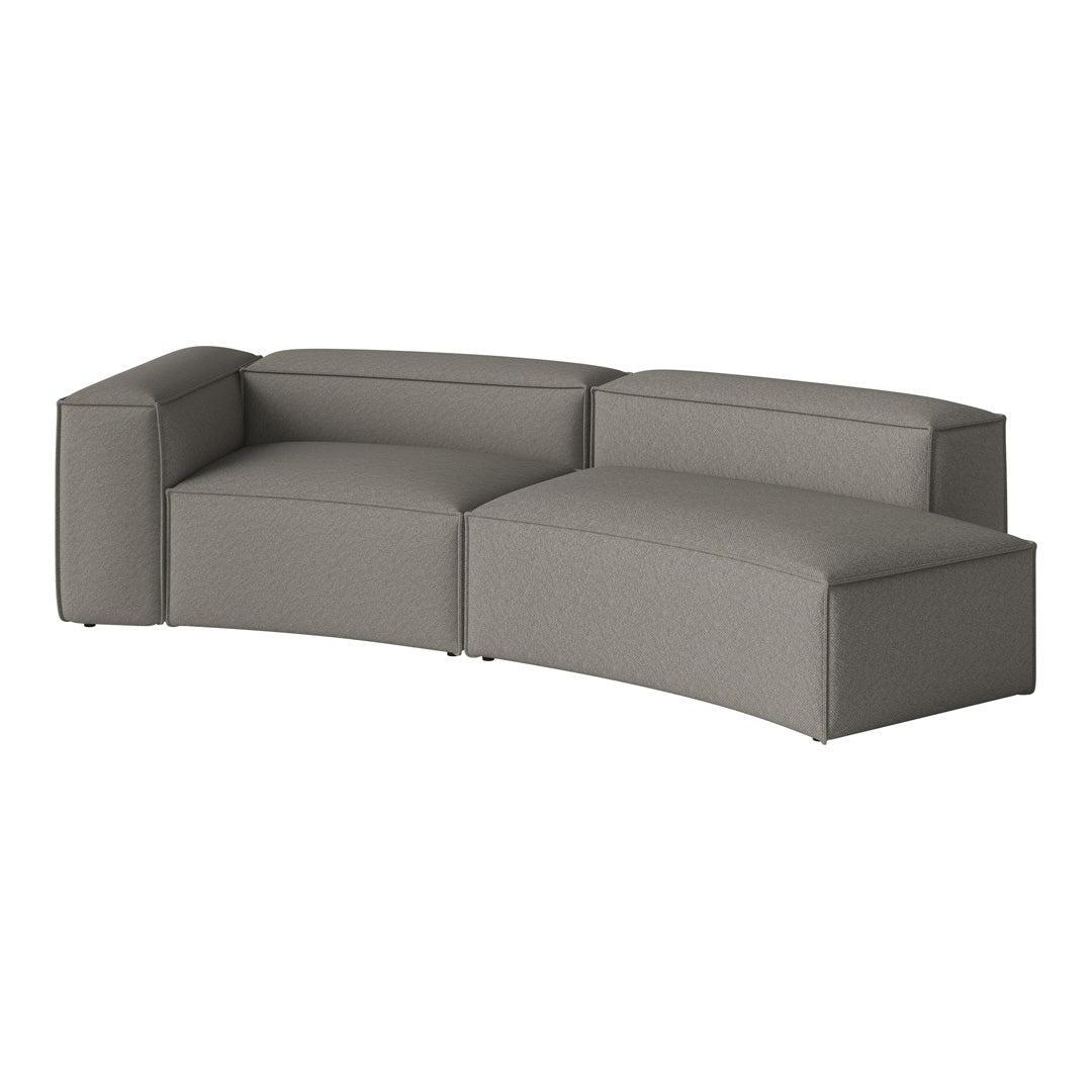 Curved gray sectional sofa with a textured fabric finish, offering modern design and comfortable seating.