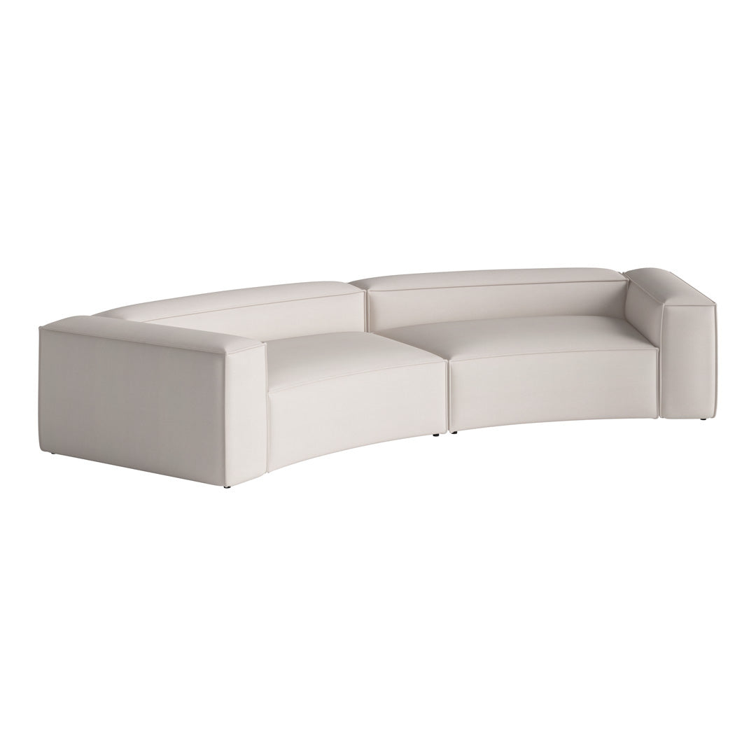 Curved white leather sectional sofa with a smooth finish and minimalist design. Perfect for modern interiors.