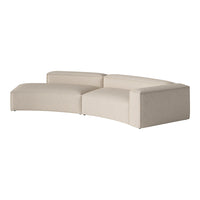 Beige curved sofa with a subtle textured pattern, perfect for modern living spaces.