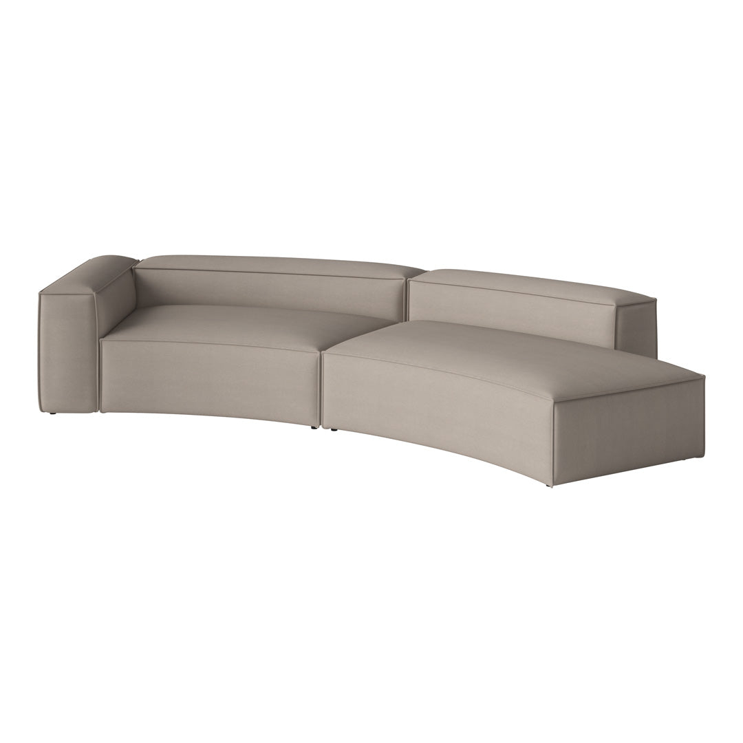 Curved modern sofa in soft taupe with a minimalist design and smooth fabric texture. Perfect for contemporary spaces.
