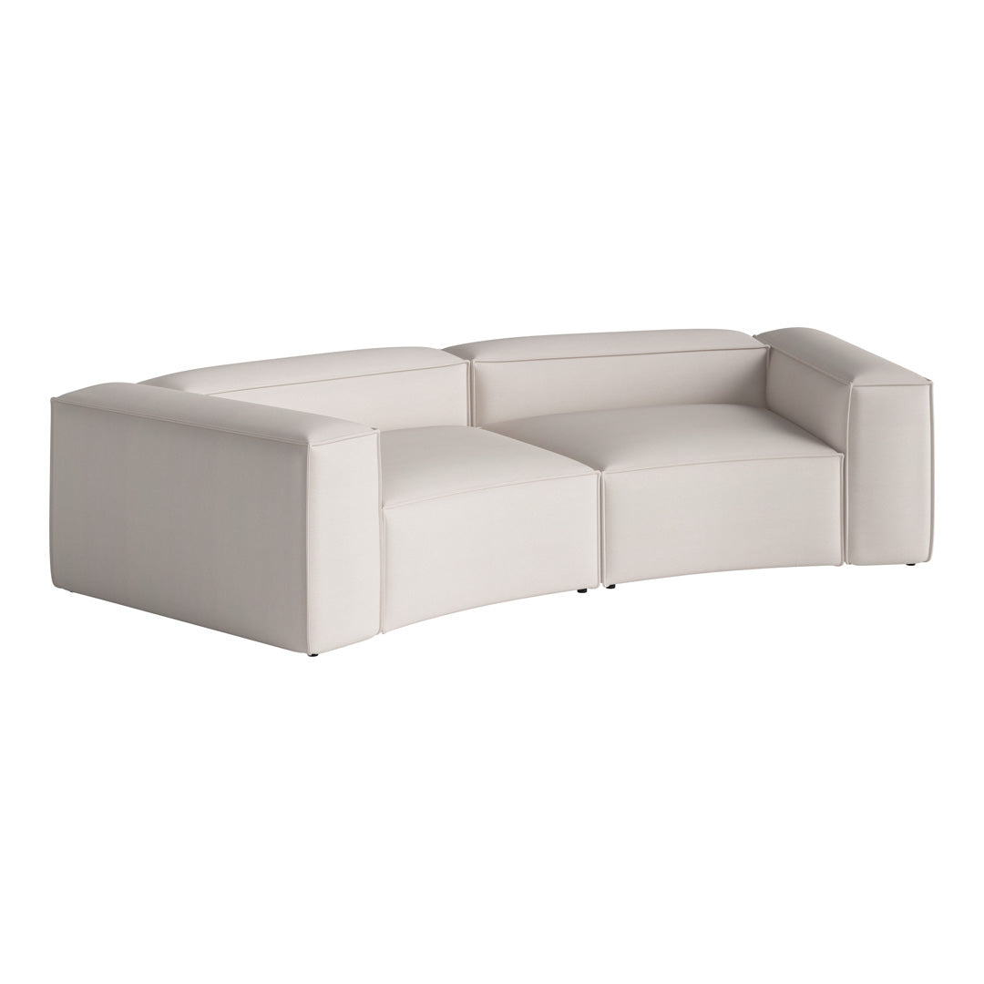 Curved sectional sofa in soft cream upholstery with a smooth, modern design. Perfect for stylish interiors.