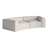 Curved sectional sofa in soft cream upholstery with a smooth, modern design. Perfect for stylish interiors.
