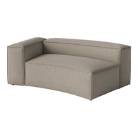 Beige curved sofa with subtle striped texture, offering a modern and stylish look for any living space.