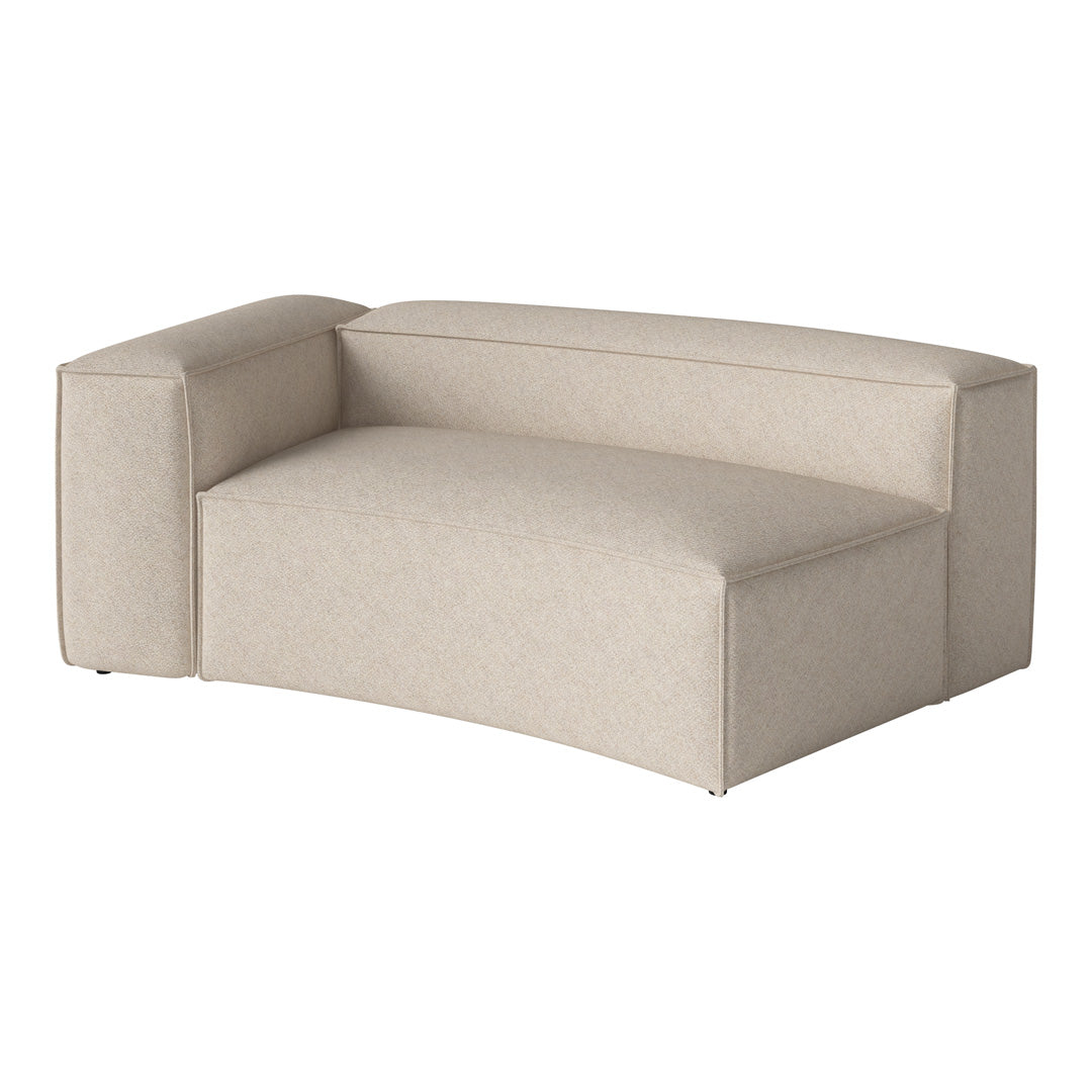 Beige curved sofa with a textured pattern, featuring soft, neutral tones for a modern decor.