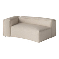 Beige curved sofa with a textured pattern, featuring soft, neutral tones for a modern decor.