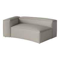 Light gray sectional sofa with a smooth, textured fabric and minimalist design, perfect for modern interiors.