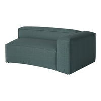 Teal curved sofa with textured fabric and seamless design, perfect for modern living spaces.