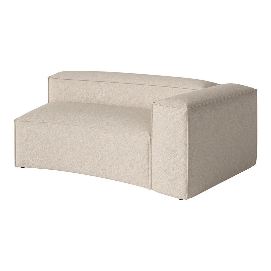 Beige upholstered sectional sofa with a smooth texture and subtle pattern, perfect for modern interiors.