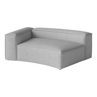 Gray upholstered sectional sofa with a textured, subtly patterned fabric. Elegant and modern design.